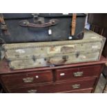 19th Century Vellum suitcase with brass locks and travel labels, bearing makers label for Victor