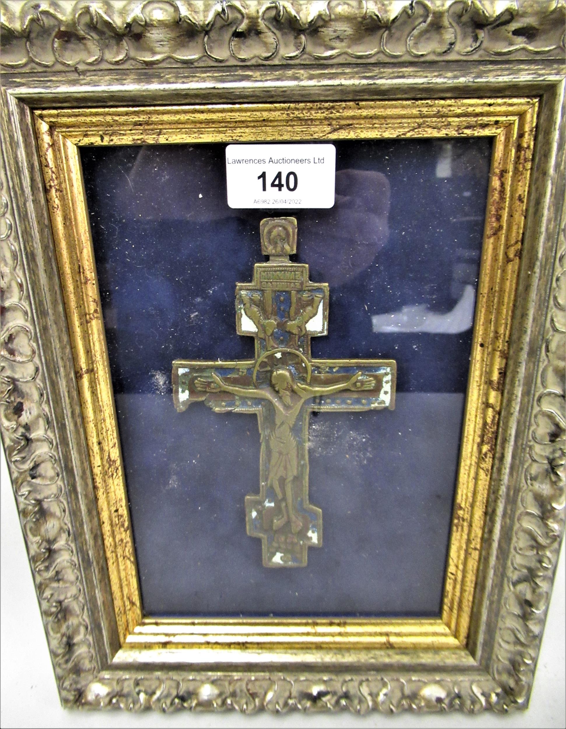 Patinated and painted brass Orthodox crucifix, 6.25ins high, in a gilt and silvered frame