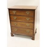 Early 20th Century mahogany George III style dwarf chest with reeded top above four long graduated