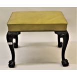 Rectangular green leather upholstered and mahogany footstool in Chippendale style, raised on