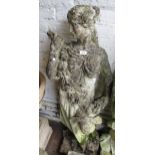 Well weathered cast concrete garden figure of a classical maiden with a floral garland, 48ins high