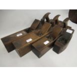 Four various W. Greenslade woodworking planes