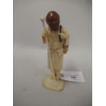 19th Century Japanese carved ivory figure of a man holding a basket, 6.5ins high