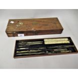 Antique mahogany box containing a quantity of various writing equipment