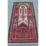 Afghan prayer rug with a tree of life centre panel flanked by similar smaller motifs, in