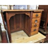 Early 20th Century child's elm single pedestal desk with drop flap, 34.5ins wide x 17ins deep x 25.