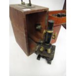 Spencer of Buffalo USA, black japanned and gilt brass monocular microscope, in fitted wooden case