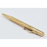 9ct Gold propelling pencil inscribed ' Baker's Pointer ', gross weight 27g