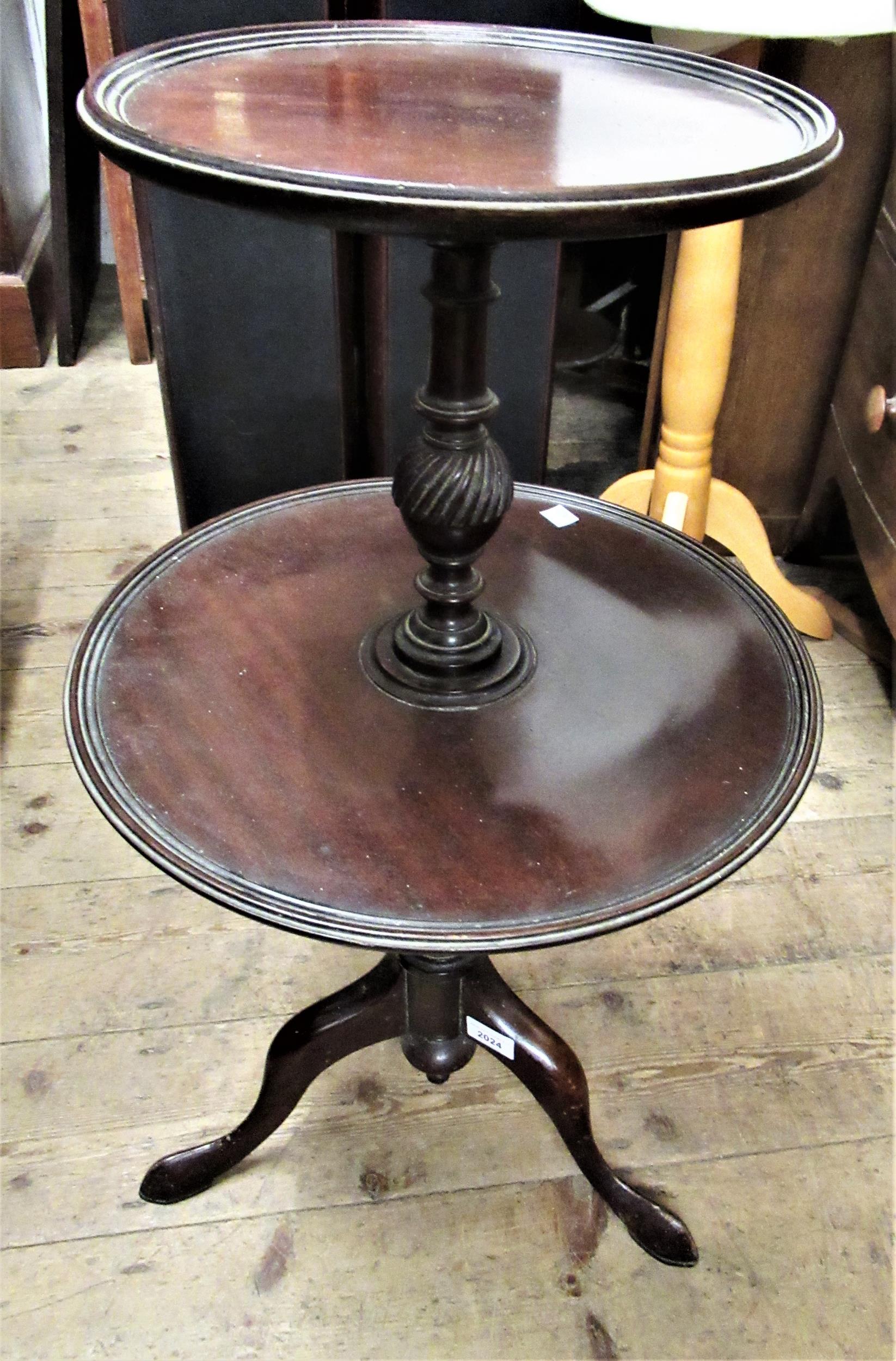 1920's Circular mahogany two tier dumb waiter on tripod support, together with a similar wine table