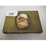 Continental brass rectangular floral engraved and enamel mounted box, decorated with a gentleman and