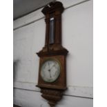 Late 19th / early 20th Century carved oak aneroid barometer thermometer by Negretti & Zambra, in