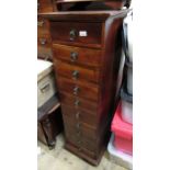 Late 20th Century exotic hardwood tall chest of ten drawers with brass ring handles and low