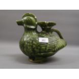 Oriental pottery green glazed figure of a duck (damages), 8.75ins wide