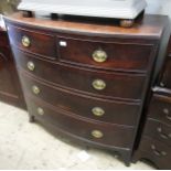 Late George III mahogany bow front chest of two short and three long drawers with oval brass