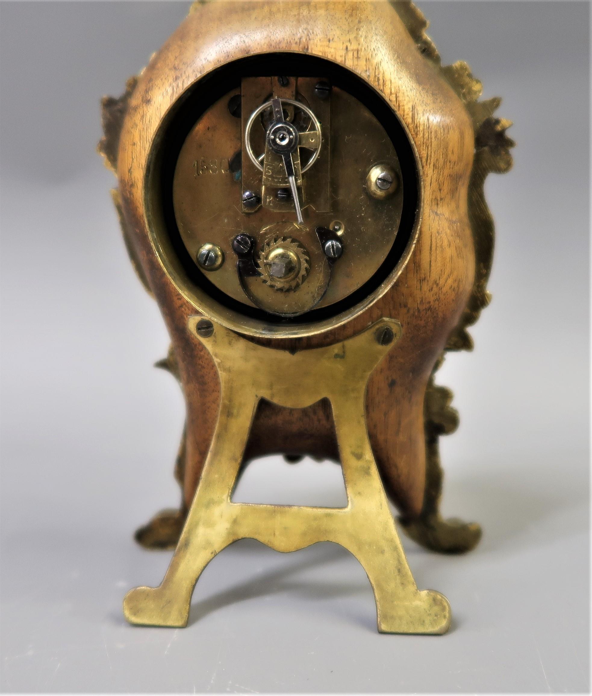 Small French gilt metal mantel clock, having circular enamel dial with Arabic and Roman numerals, - Image 2 of 7