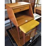Mid 20th Century teak telephone table with integral stool and drawer and a mid 20th Century