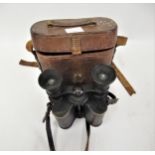 Early 20th Century military marked pair of leather covered black japanned Prism binoculars by Ross