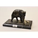 Small late 19th / early 20th Century patinated bronze figure of an elephant on a rectangular