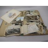 Album of early 20th Century postcards together with loose postcards