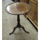 George III mahogany pedestal table, the circular dish top with tilt mechanism above a vase turned