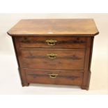 19th Century French mahogany chest of three graduated drawers with ormolu handles flanked by