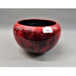 Zsolnay red lustre jardiniere decorated with trees in a landscape, bearing mark and paper label to