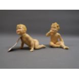 Pair of porcelain figures of children, 4.5ins high