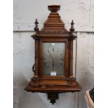 Victorian oak Gothic revival bracket clock with bracket, the silvered dial inscribed Howell