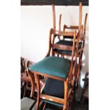 Set of six (four plus two) reproduction brass inlaid rail back dining chairs on sabre leg front