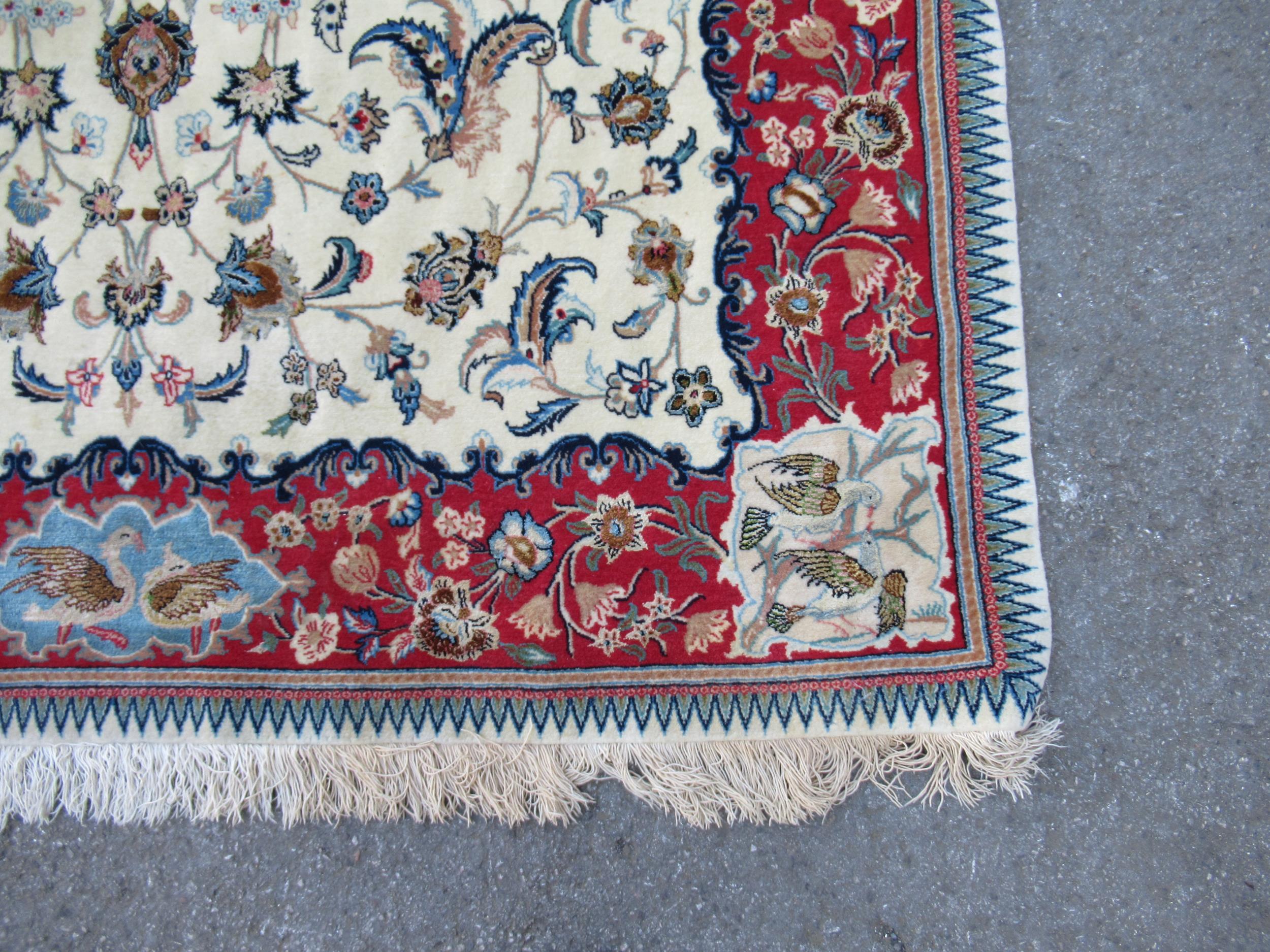 Isfahan part silk rug with a medallion, pictorial and all-over floral design on an ivory ground with - Image 5 of 13
