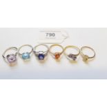 Group of six 9ct yellow and white gold gem set dress rings