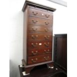 Reproduction mahogany tall chest of seven drawers with brass swan neck handles and brushing slide