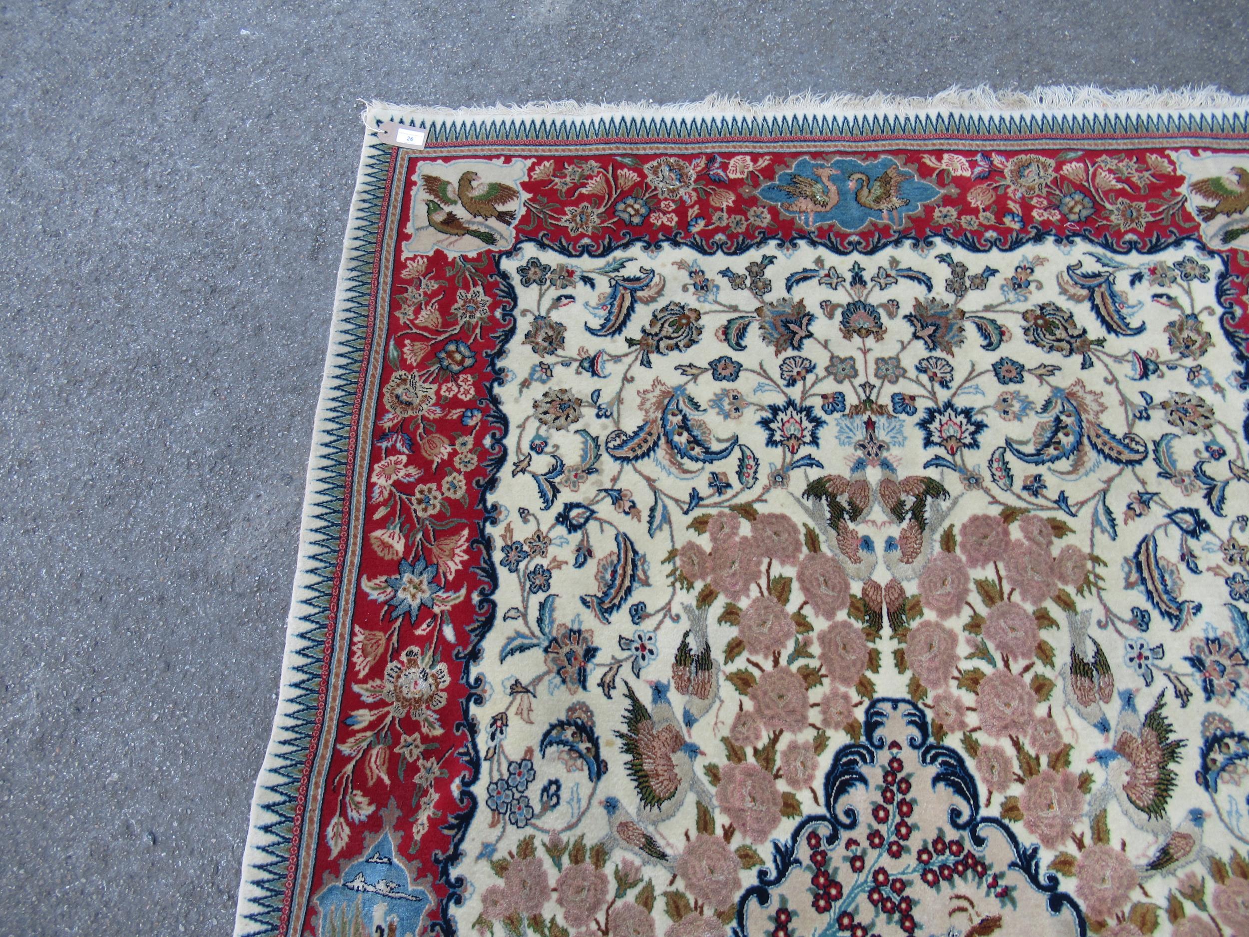 Isfahan part silk rug with a medallion, pictorial and all-over floral design on an ivory ground with - Image 9 of 13