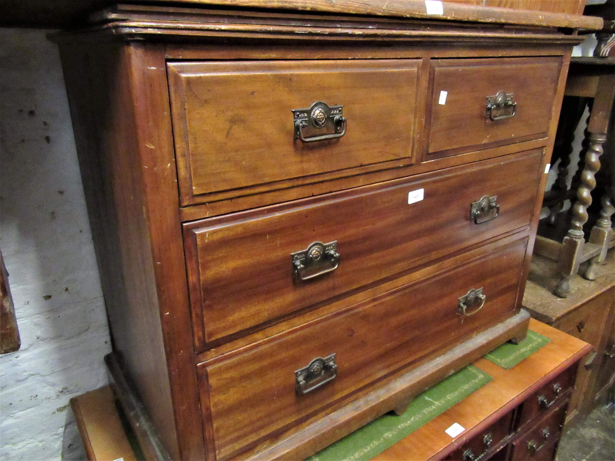Victorian mahogany straight front chest of two short and two long drawers with brass handles,