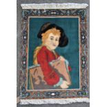 Small Indo Persian pictorial rug depicting portrait of a child, 26ins x 19ins