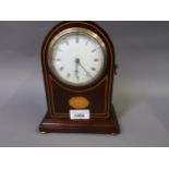 Small Edwardian mahogany line and lunette inlaid mantel clock, the convex enamel dial with Arabic