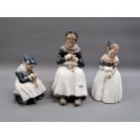 Group of three graduated Royal Copenhagen figures of mother and two children, the largest 9ins high