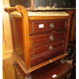 Early 20th Century mahogany piano stool with a three drawer base on low cabriole supports