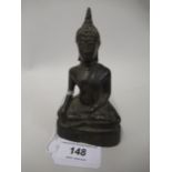 Oriental bronze figure of a seated Buddha, 4.5ins high