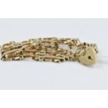 9ct Gold gate link bracelet with padlock clasp, 11.5g