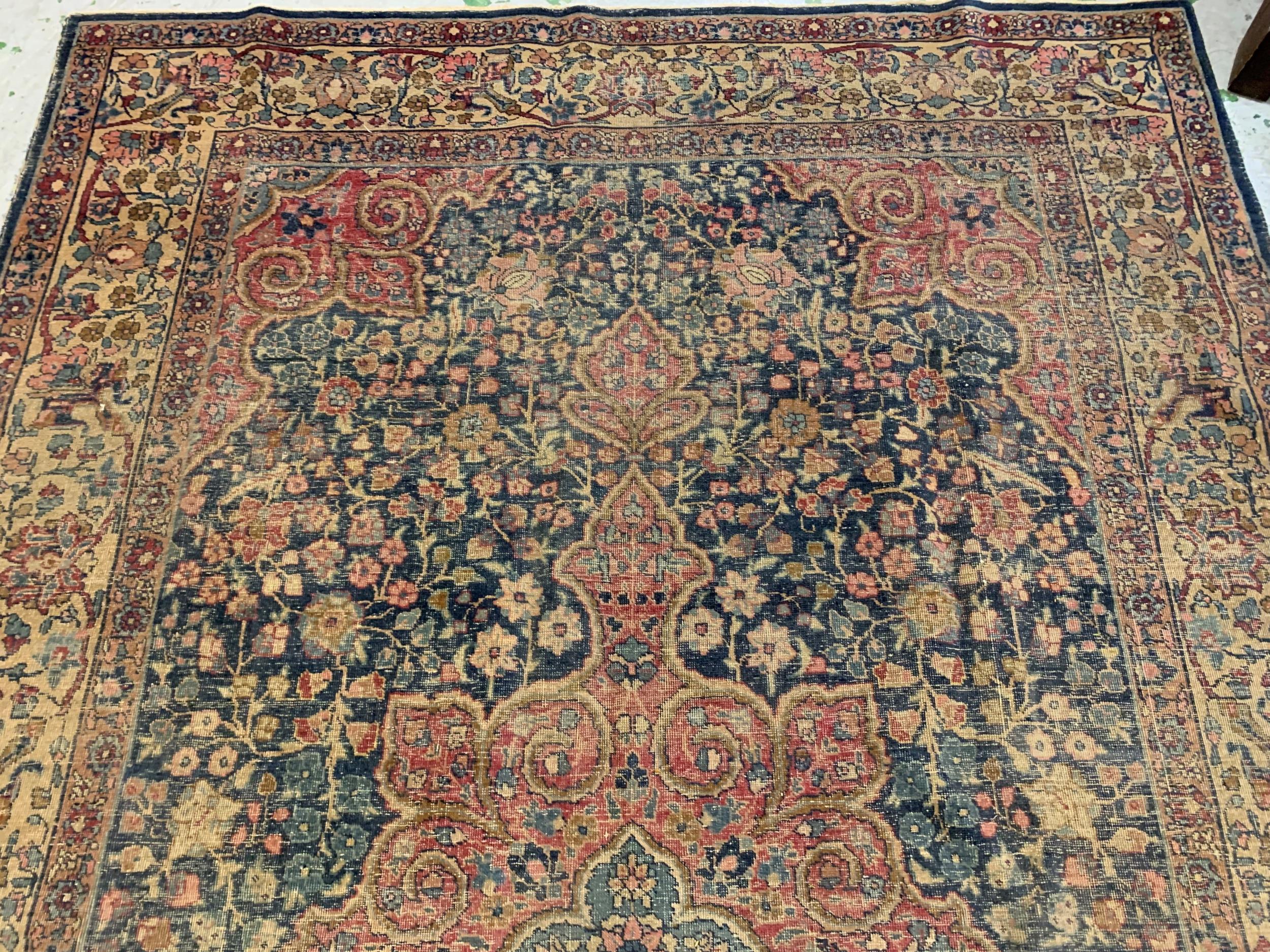 Tabriz carpet with a lobed medallion and all-over floral design on a midnight blue ground with - Image 3 of 5