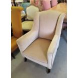 Edwardian upholstered square tub chair on square tapering front supports