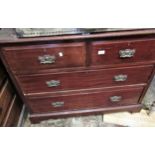 Edwardian mahogany chest of two short and two long drawers with brass handles and bracket feet,