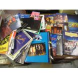 Box containing a collection of various theatre programmes from the 1970's onwards