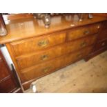 Late 19th / early 20th Century walnut chest of two short and two long drawers with brass handles and