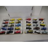 Box containing two trays of mainly Corgi diecast model vehicle Morris Minor cars, police vehicles