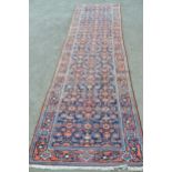 Hamadan runner with all-over Herati design on a midnight blue ground with borders, 12ft 10ins x