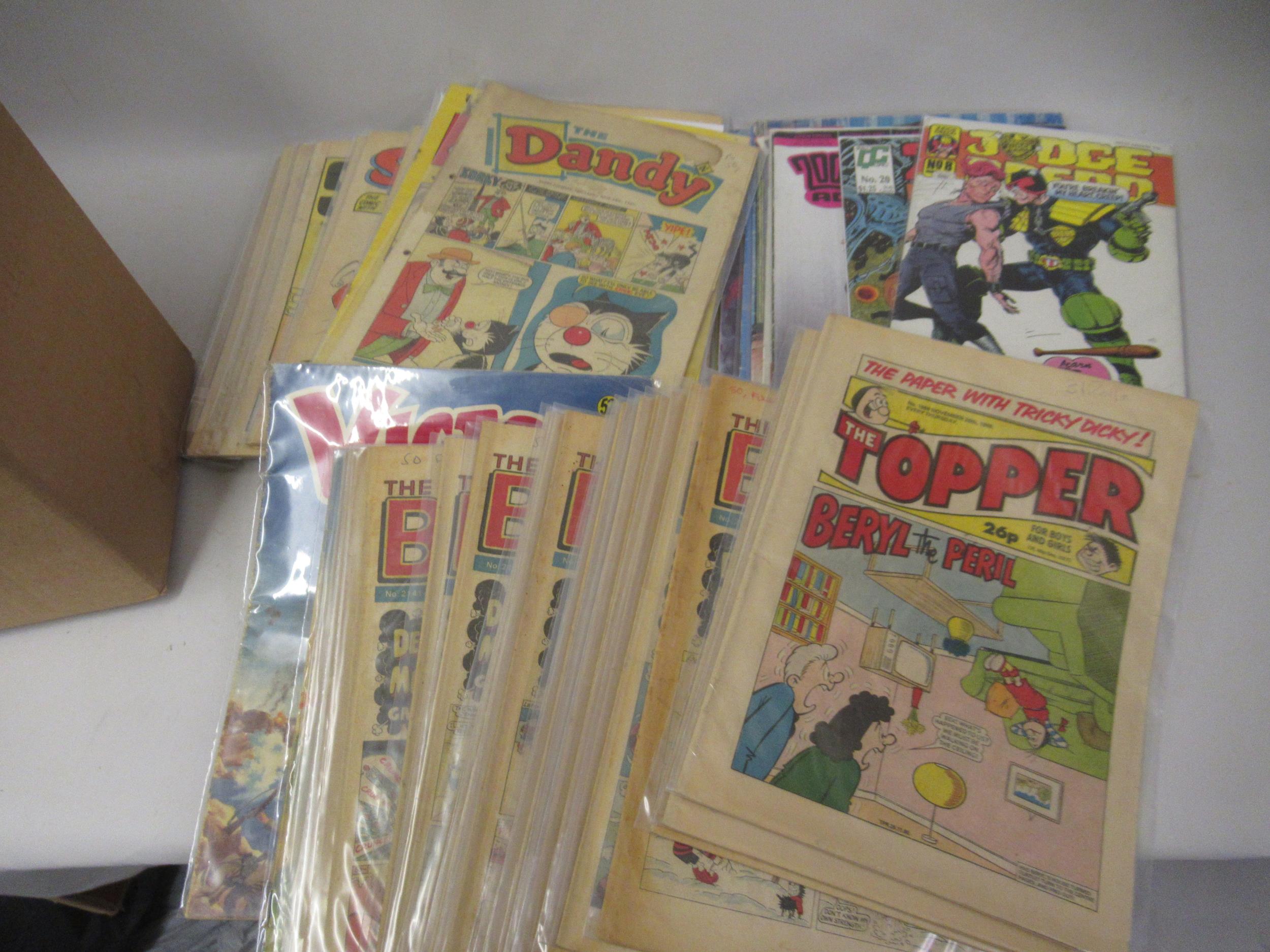 Box containing a collection of 1960's and 70's comics, including Dandy, Bing, Beano, Victor,