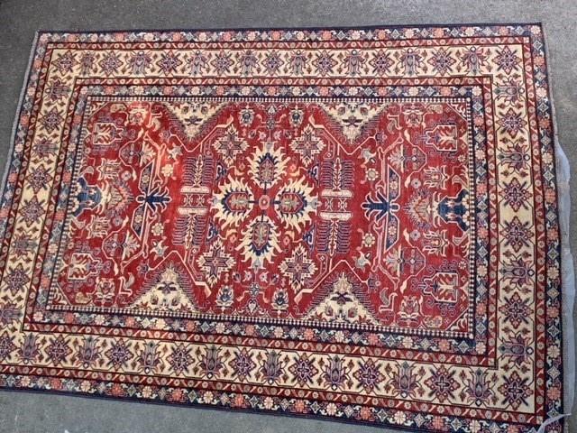 Good quality modern Afghan Ziegler type carpet with an all-over palmette design on a red ground with