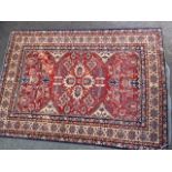 Good quality modern Afghan Ziegler type carpet with an all-over palmette design on a red ground with
